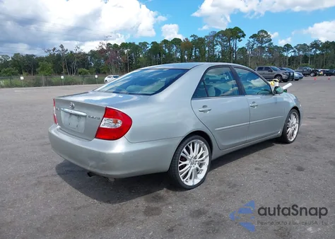 2004 Toyota Camry Le from USA, damaged, VIN 4T1BE32K74U838272